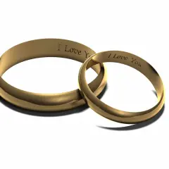 Złote obrączki ślubne z wygrawerowanym napisem "I Love You". Podwójny grawer na obrączkach ślubnych symbolizuje wieczną miłość.